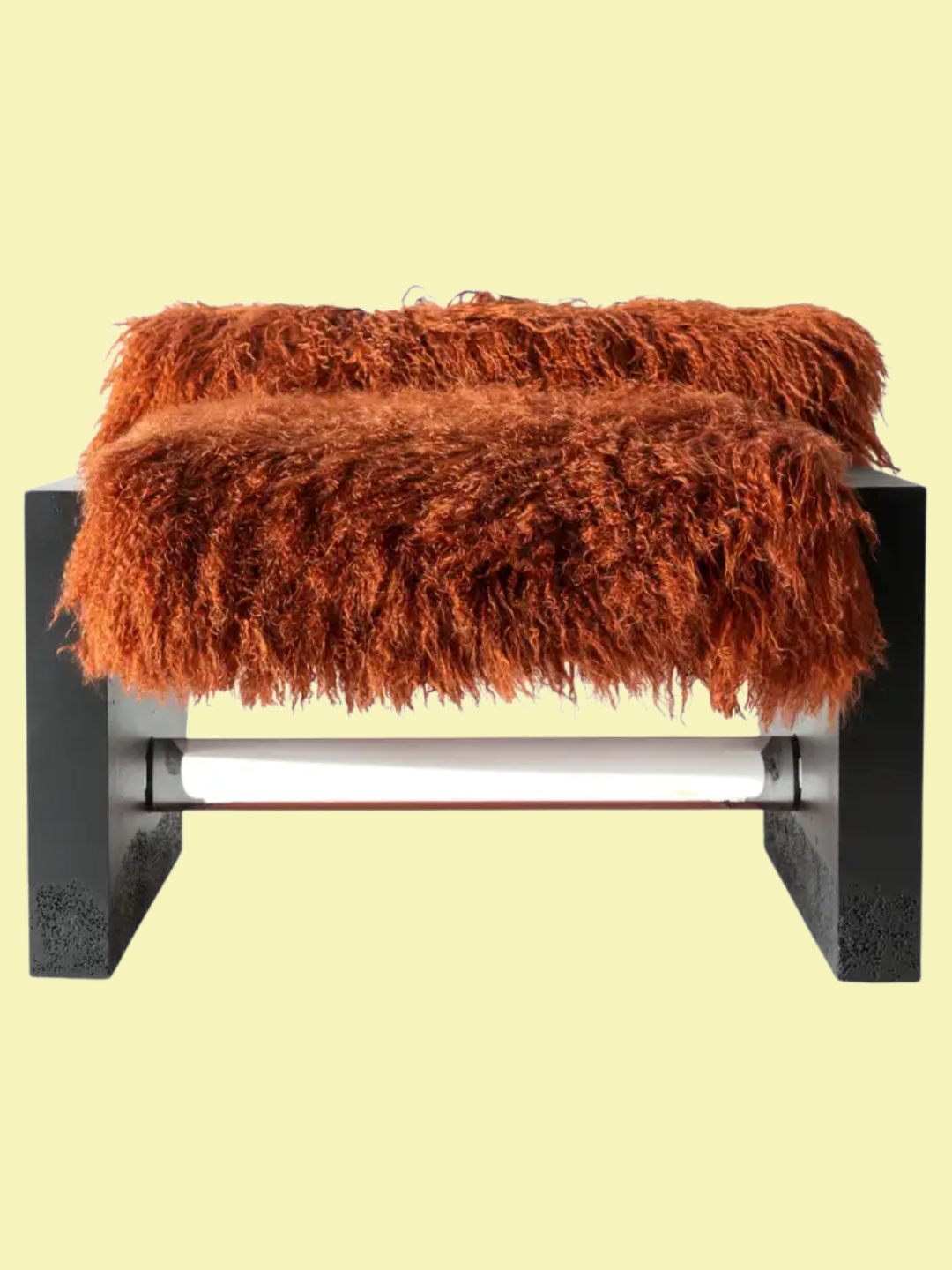 A fuzzy orange-brown seat on concrete legs with a lucite ledge
