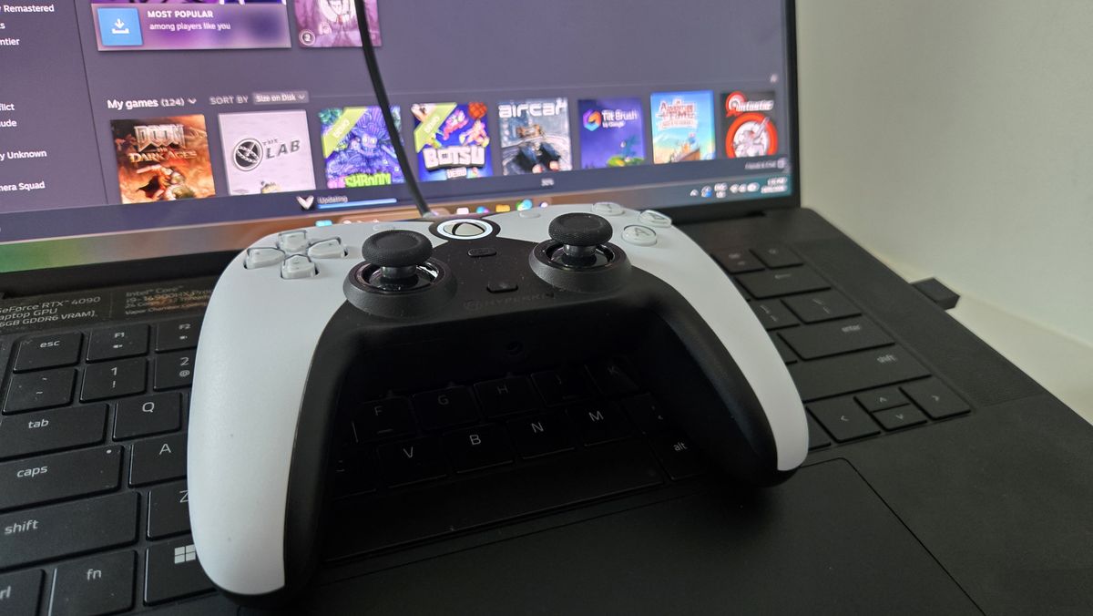 The Hyperkin Competitor on a gaming laptop.