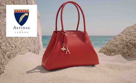 Aspinal of London logo top left with a red bag