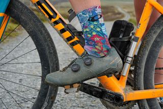 Anna wearing Pearl Izumi’s Expedition Pro Shoe while riding the Trans Cambrian Way