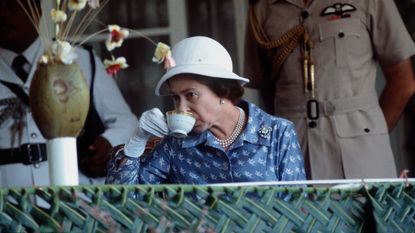 The Queen In Nauru Drinking A Cup Of Tea in 1982.
