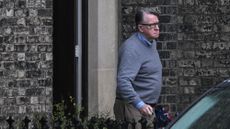 Peter Mandelson leaving a building