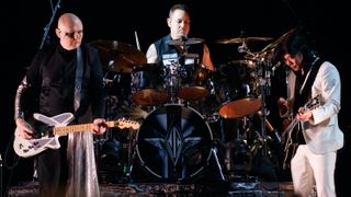 Billy Corgan, Jimmy Chambelin and James Iha of Smashing Pumpkins perform on stage at The SSE Arena Wembley on October 16, 2018 in London, England