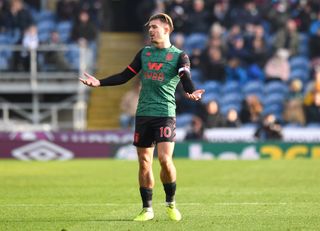 Jack Grealish reacts after his effort is ruled out