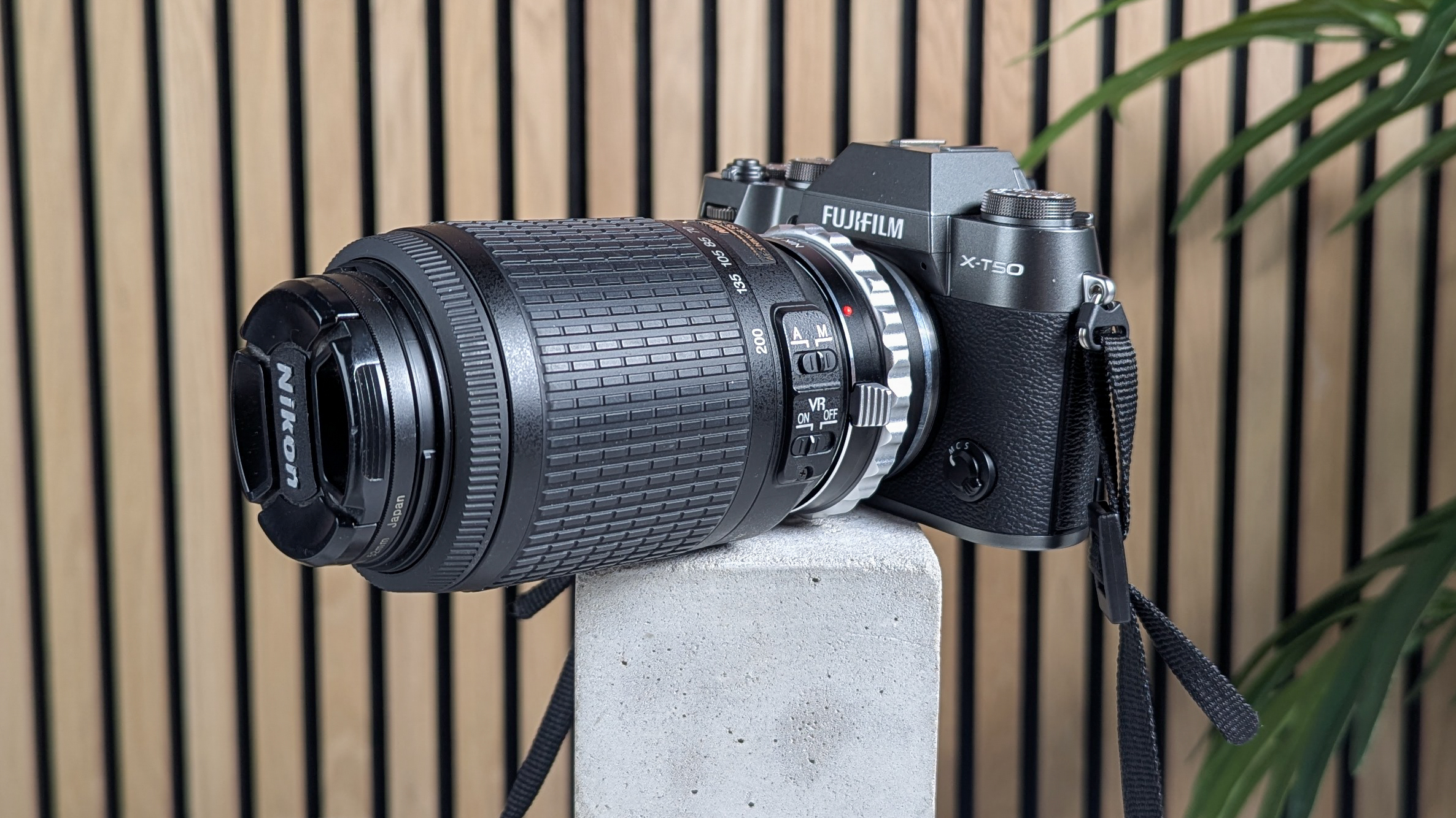 A Nikon lens on a Fujifilm X-T50 camera