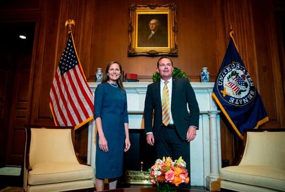 Supreme Court nominee Judge Amy Coney Barrett (L) meets with US Senator Mike Lee (R-UT) at the US Capitol in Washington, DC on September 29, 2020.
