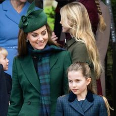 Kate Middleton wears head to toe forest green on Christmas Day and poses with daughter Princess Charlotte, who has similar hair