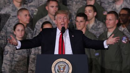 Trump order bans transgender military troops from serving