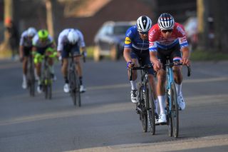 DOUR BELGIUM MARCH 02 Florian Senechal of France and Team Deceuninck QuickStep Mathieu van der Poel of The Netherlands and Team AlpecinFenix during the 53rd Grand Prix Le Samyn 2021 Mens Elite a 2054km race from Quaregnon to Dour GPSamyn on March 02 2021 in Dour Belgium Photo by Luc ClaessenGetty Images