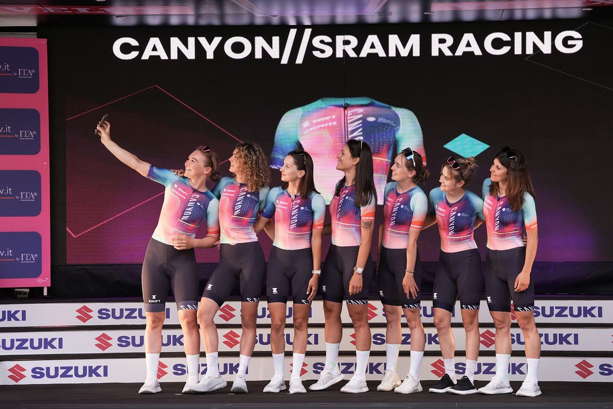 CanyonSRAM take a selfie on stage at the 2024 Giro d'Italia Women at the teams presentation at the Piazza della Loggia in Brescia