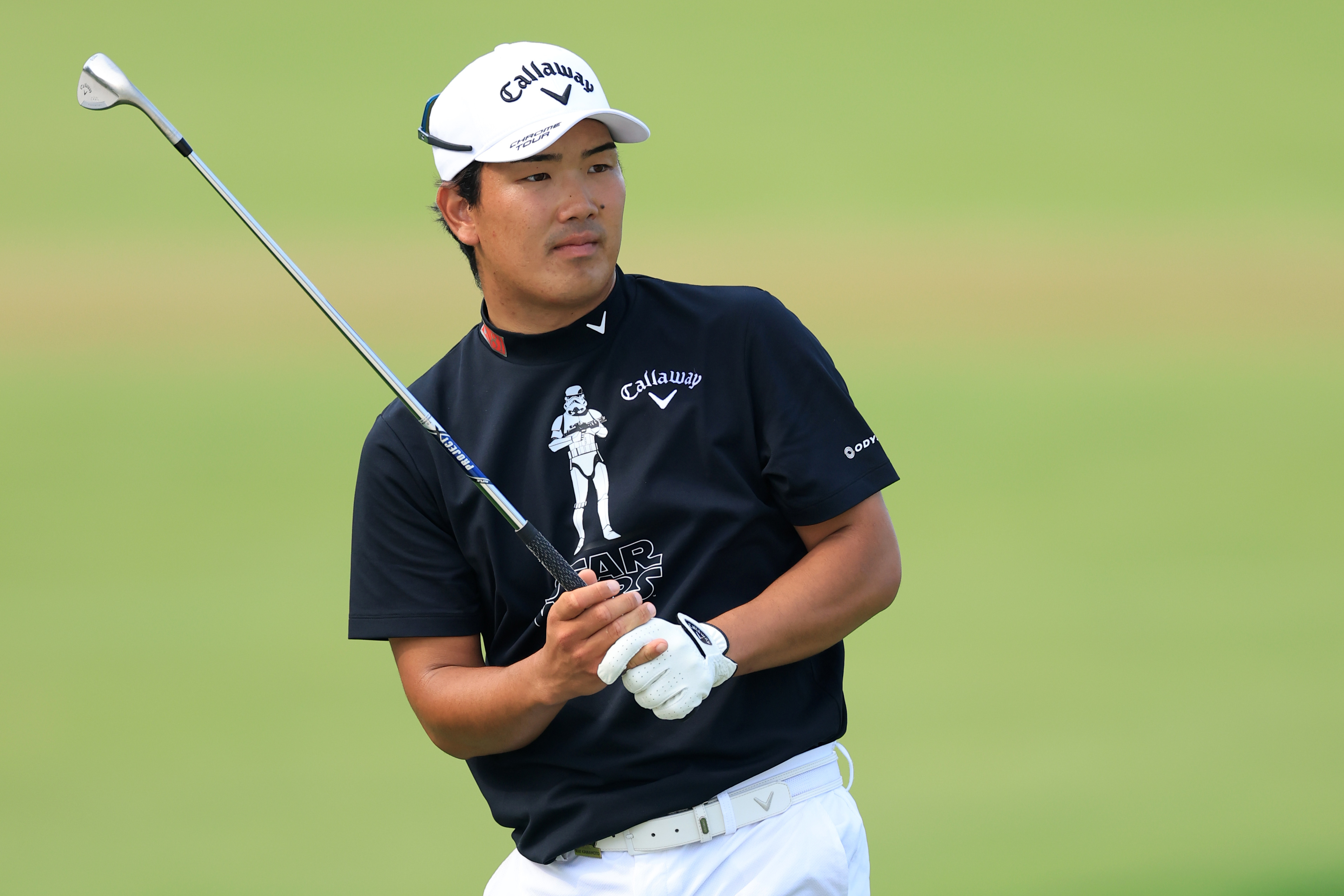 Riki Kawamoto wears a black Star Wars Callaway golf shirt during the 2025 US Open
