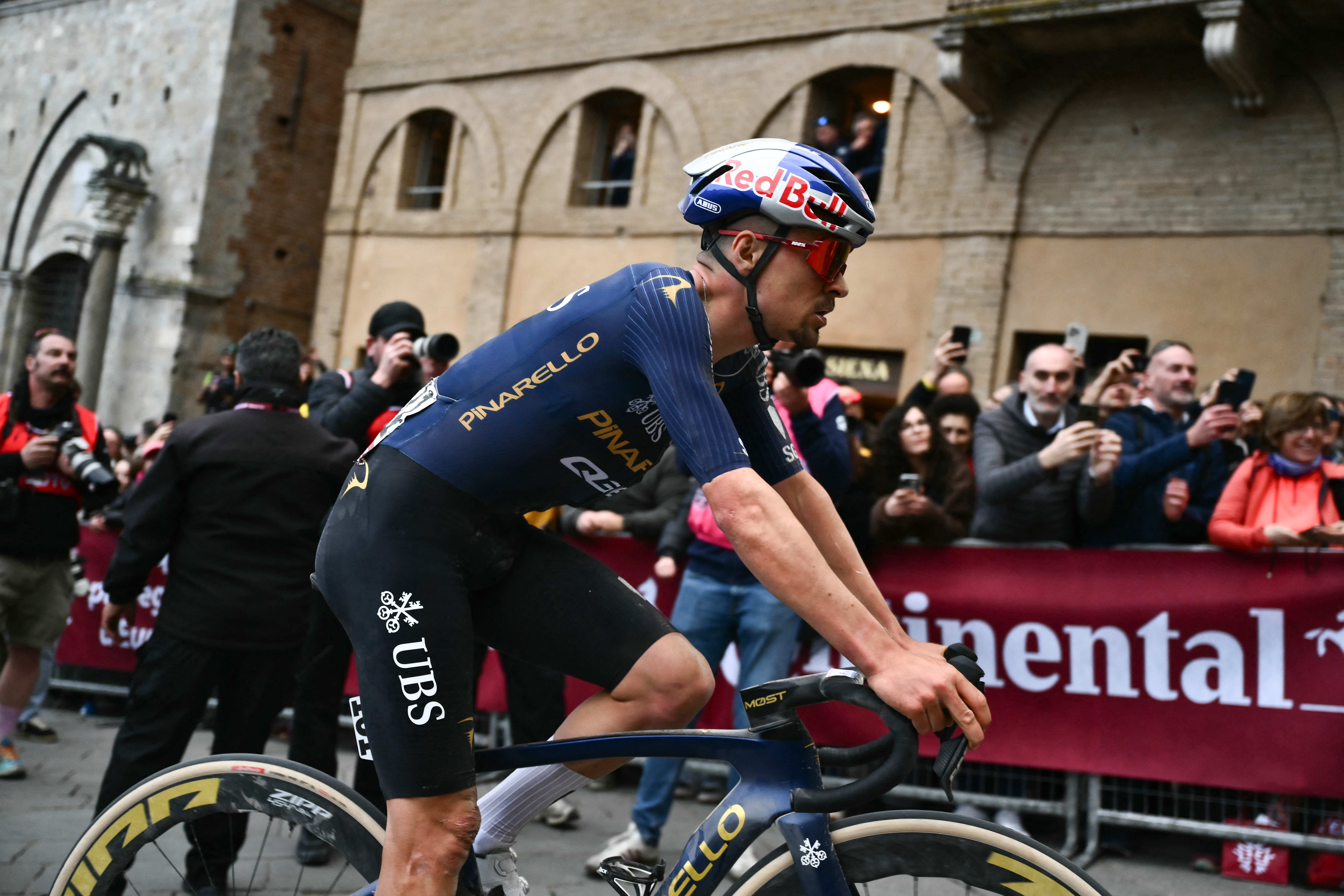 Tom Pidcock after the 2026 Strade Bianche