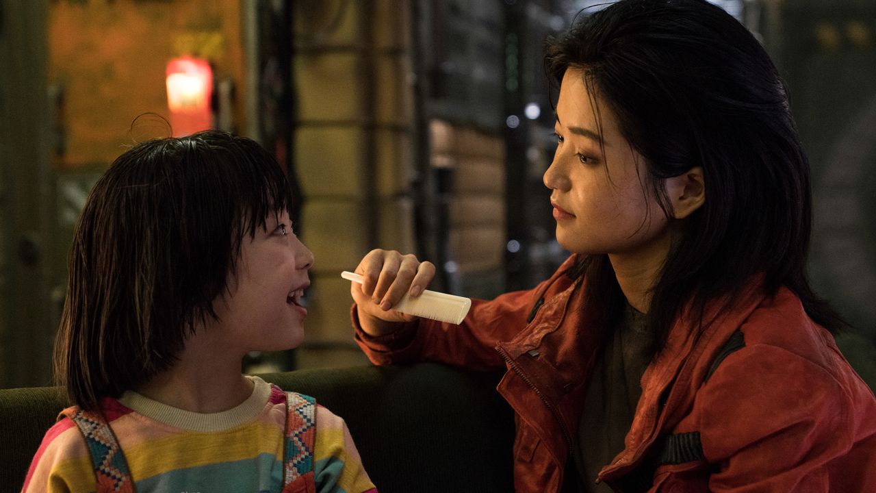 Dorothy/Kot-nim (Ye-Rin Park) and Captain Jang (Kim Tae-ri) get some quality time in "Space Sweepers" on Netflix.