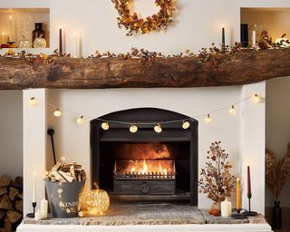 fall decor around a fireplace