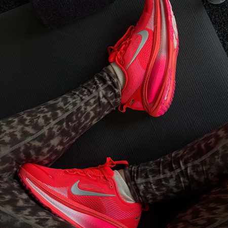 Who What Wear editor Ana Escalante wearing plus size activewear and nike running shoes.