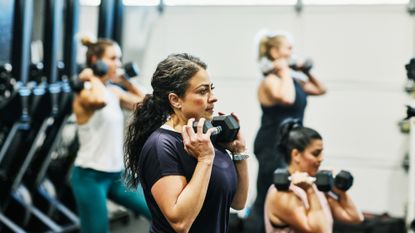 Woman exercising with a dumbbell