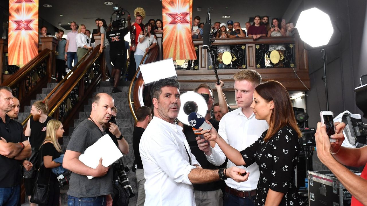 Simon Cowell being interviewed