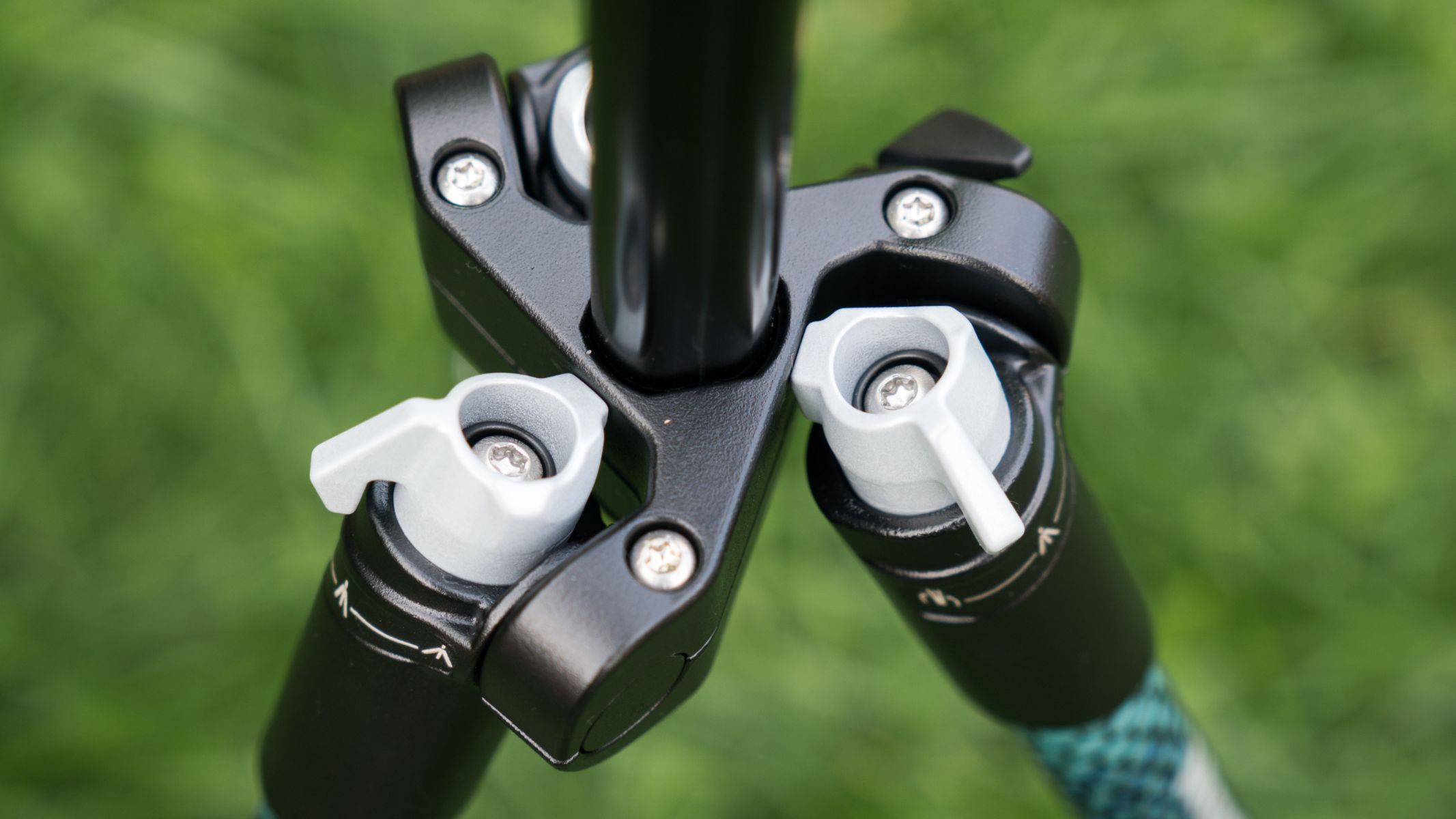 A close up view of the locking levers on the tripod legs