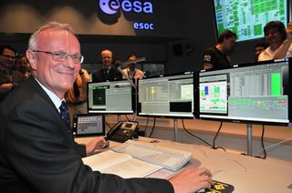 Martin Kessler, head of ESA's science operations department, sends the final command to the Herschel space telescope from the European Space Operations Center in Darmstadt, Germany.