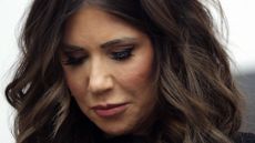 WASHINGTON, DC - JANUARY 15: U.S. Secretary of Homeland Security Kristi Noem bows her head during the benediction at the Assumption of Command Ceremony for U.S. Coast Guard Commandant Adm. Kevin E. Lunday at the U.S. Coast Guard Headquarters on January 15, 2026 in Washington, DC. Lunday will was sworn in as the 28th Commandant of the United States Coast Guard, replacing outgoing Commandant Admiral Linda Fagan. (Photo by Kevin Dietsch/Getty Images)
