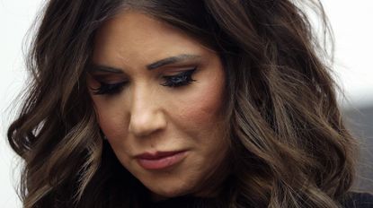 WASHINGTON, DC - JANUARY 15: U.S. Secretary of Homeland Security Kristi Noem bows her head during the benediction at the Assumption of Command Ceremony for U.S. Coast Guard Commandant Adm. Kevin E. Lunday at the U.S. Coast Guard Headquarters on January 15, 2026 in Washington, DC. Lunday will was sworn in as the 28th Commandant of the United States Coast Guard, replacing outgoing Commandant Admiral Linda Fagan. (Photo by Kevin Dietsch/Getty Images)