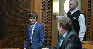 Ian looks to Bobby as he enters the court