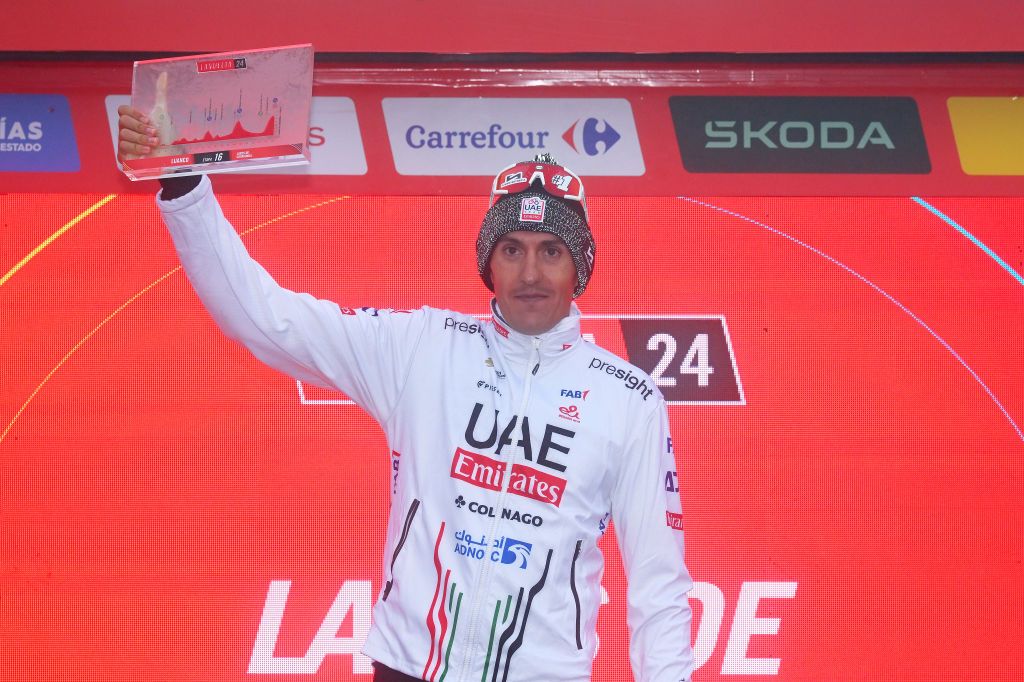 LAGOS DE COVADONGA SPAIN SEPTEMBER 03 Marc Soler of Spain and UAE Team Emirates celebrates at podium as stage winner during the La Vuelta 79th Tour of Spain 2024 Stage 16 a 1815km stage Luanco to Lagos de Covadonga 1069m UCIWT on September 03 2024 in Lagos de Covadonga Spain Photo by Tim de WaeleGetty Images