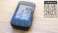 Wahoo Elemnt Bolt on a wooden surface, with a Gear of the Year badge in the corner