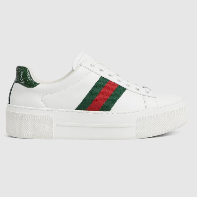 white trainers with green and red stripes