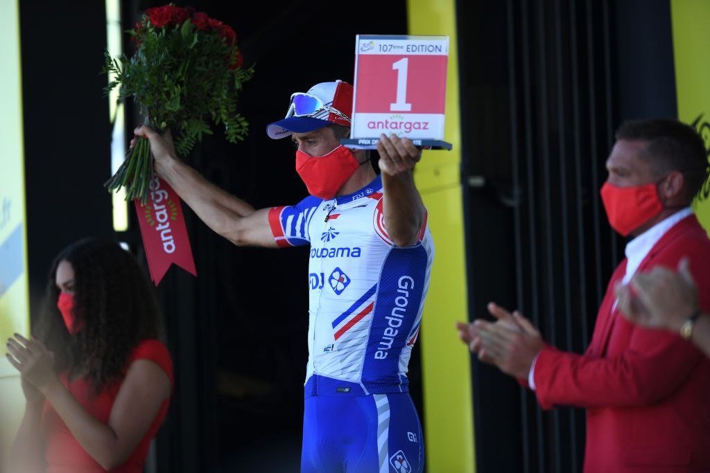 POITIERS FRANCE SEPTEMBER 09 Podium Matthieu Ladagnous of France and Team Groupama FDJ Most Combative Rider Celebration Mask Trophy Flowers Covid safety measures during the 107th Tour de France 2020 Stage 11 a 1675km stage from ChatelaillonPlage to Poitiers TDF2020 LeTour on September 09 2020 in Poitiers France Photo by Tim de WaeleGetty Images