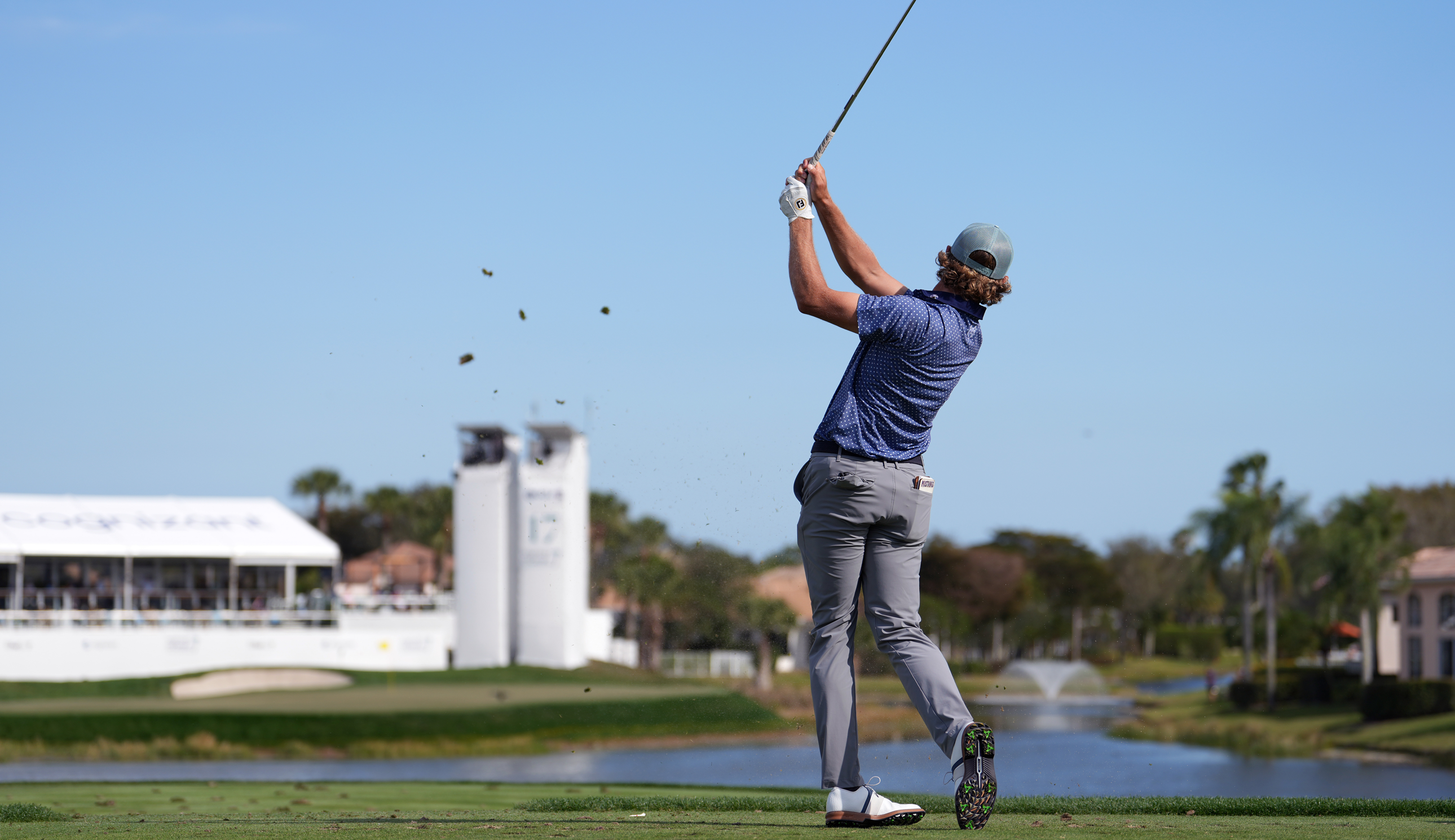 Austin Smotherman hits an approach shot into the green