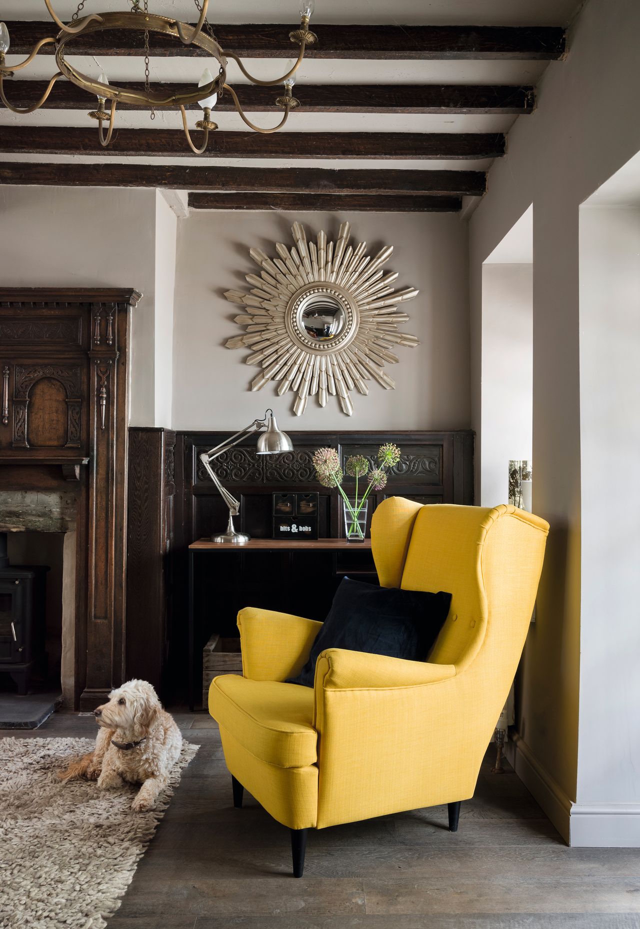cottage living room with dark wood wall panelling