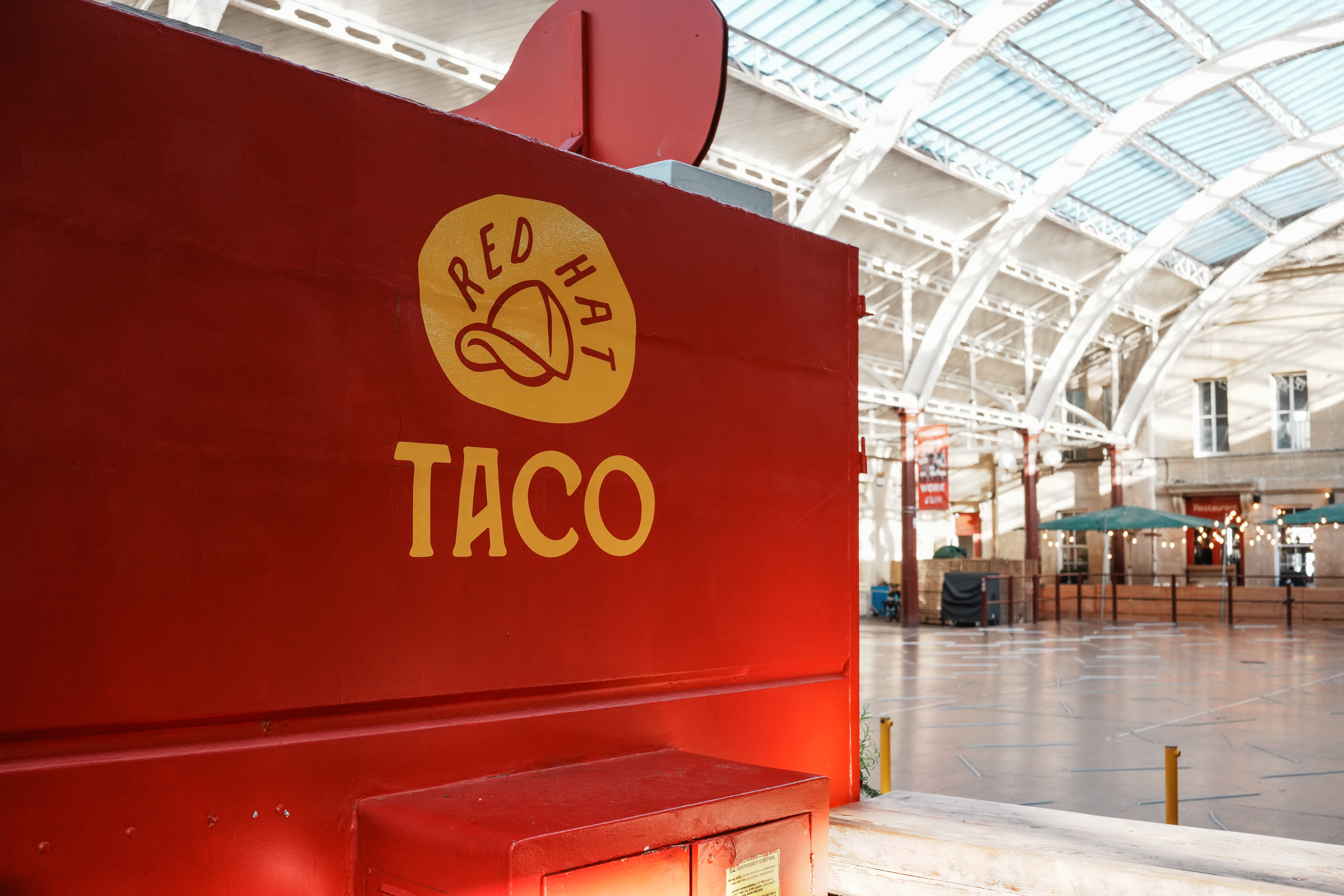 A photo of a red taco van