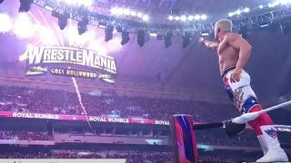 Cody Rhodes pointing to the WrestleMania sign after winning the 2023 Royal Rumble