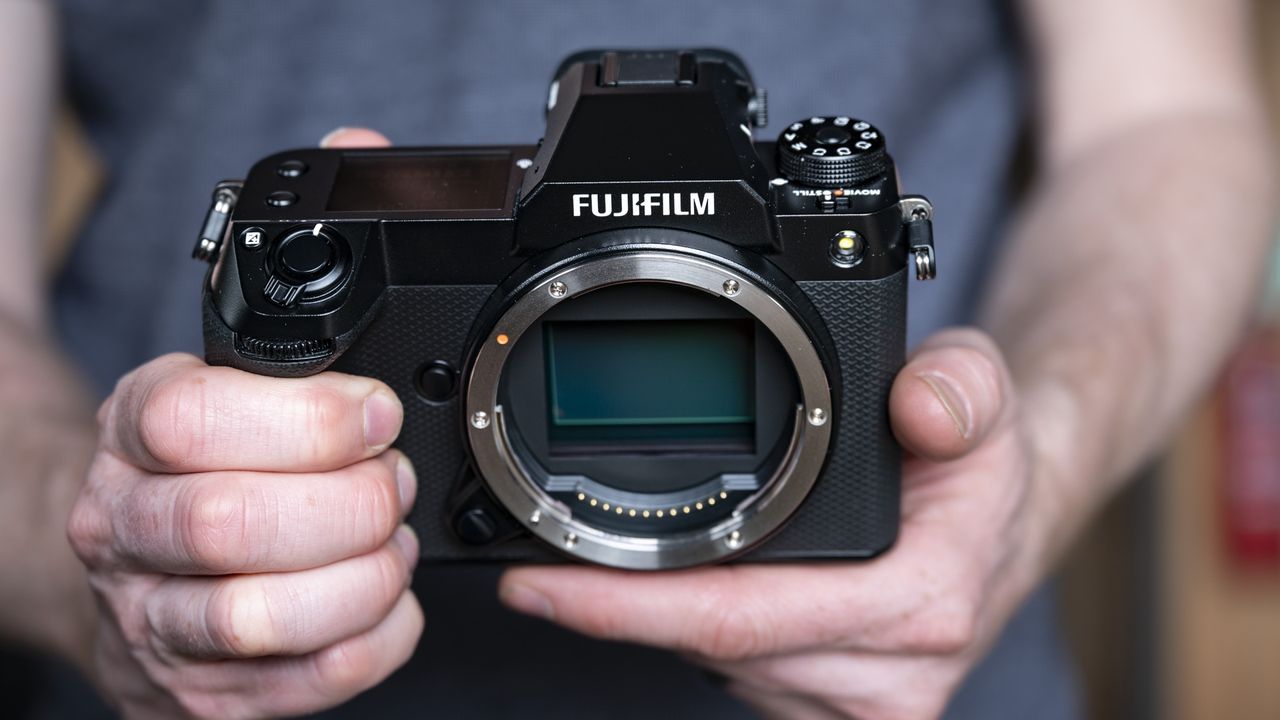 Fujifilm GFX100S II camera in the hand no lens attached