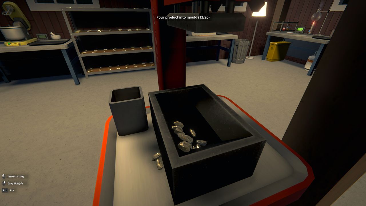 Schedule 1 brick press - Adding product to the mould in the press before activating it.