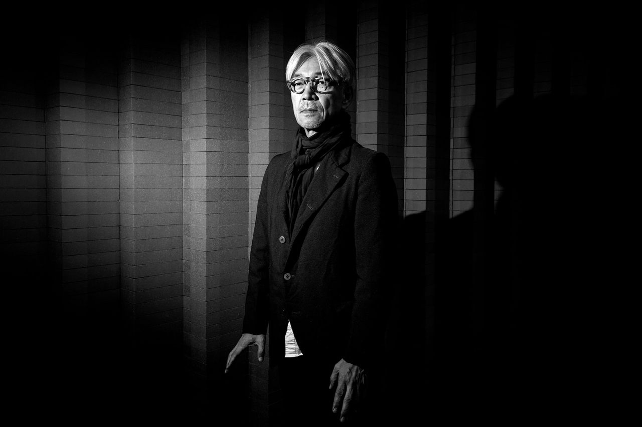 black and white portrait of composer Ryuichi Sakamoto