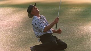 Greg Norman collapses on the final green at Augusta National after losing the 1996 Masters