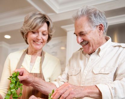 couple cooking dinner