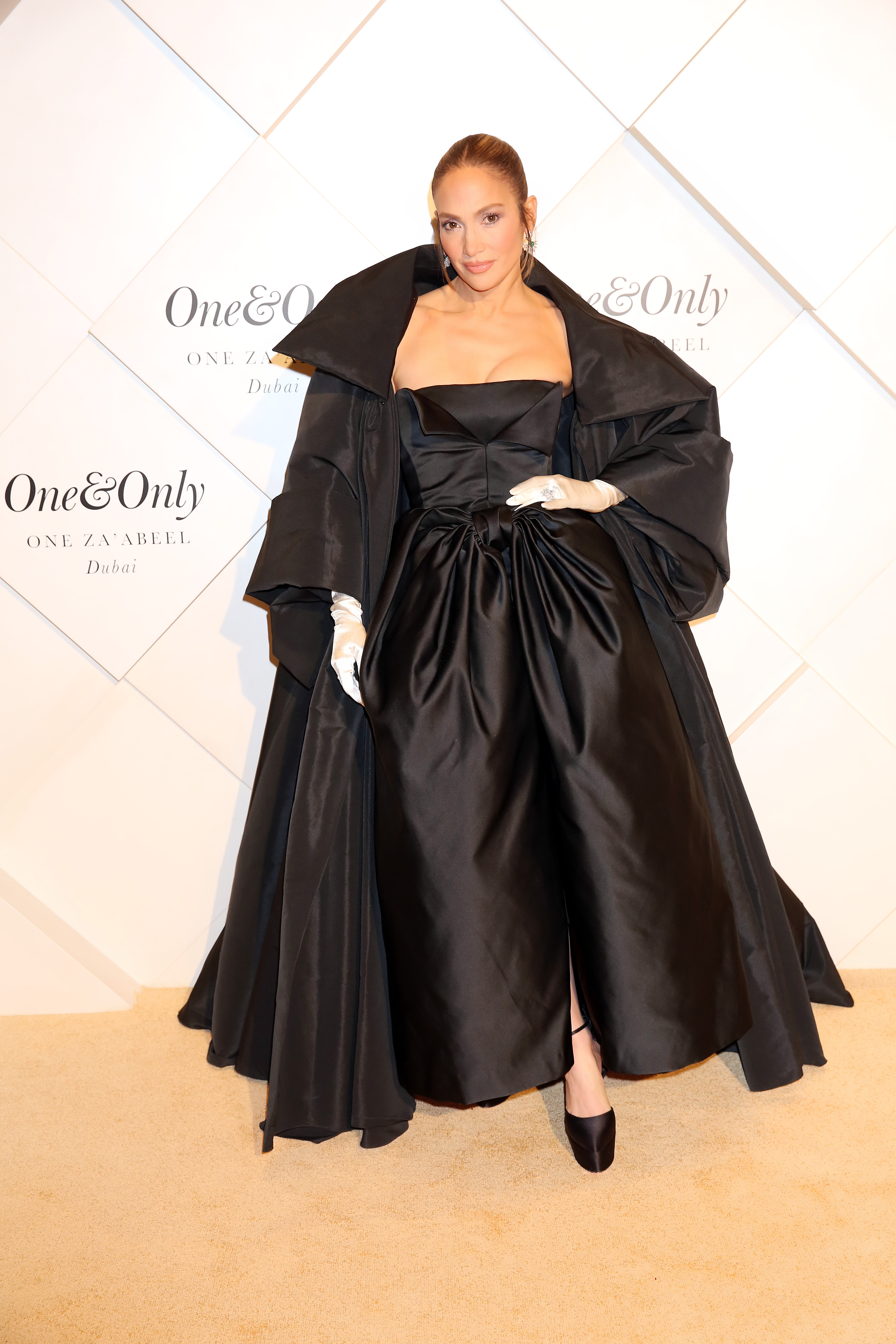 Jennifer Lopez wore a black full-coerage gown in Dubai in February 2024