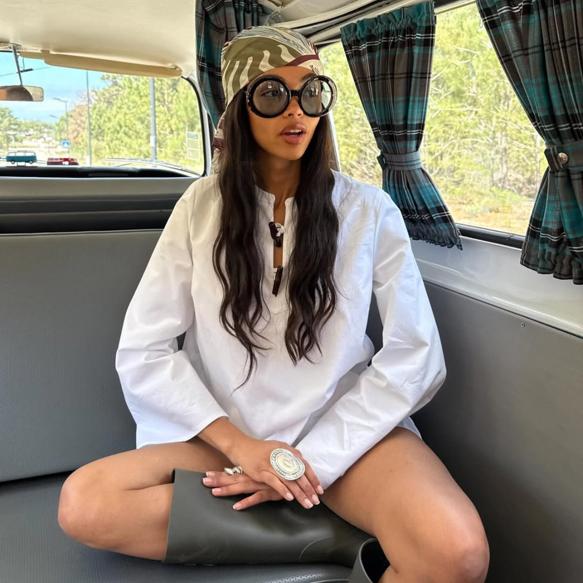 @cristinachenii wears headscarf white dress