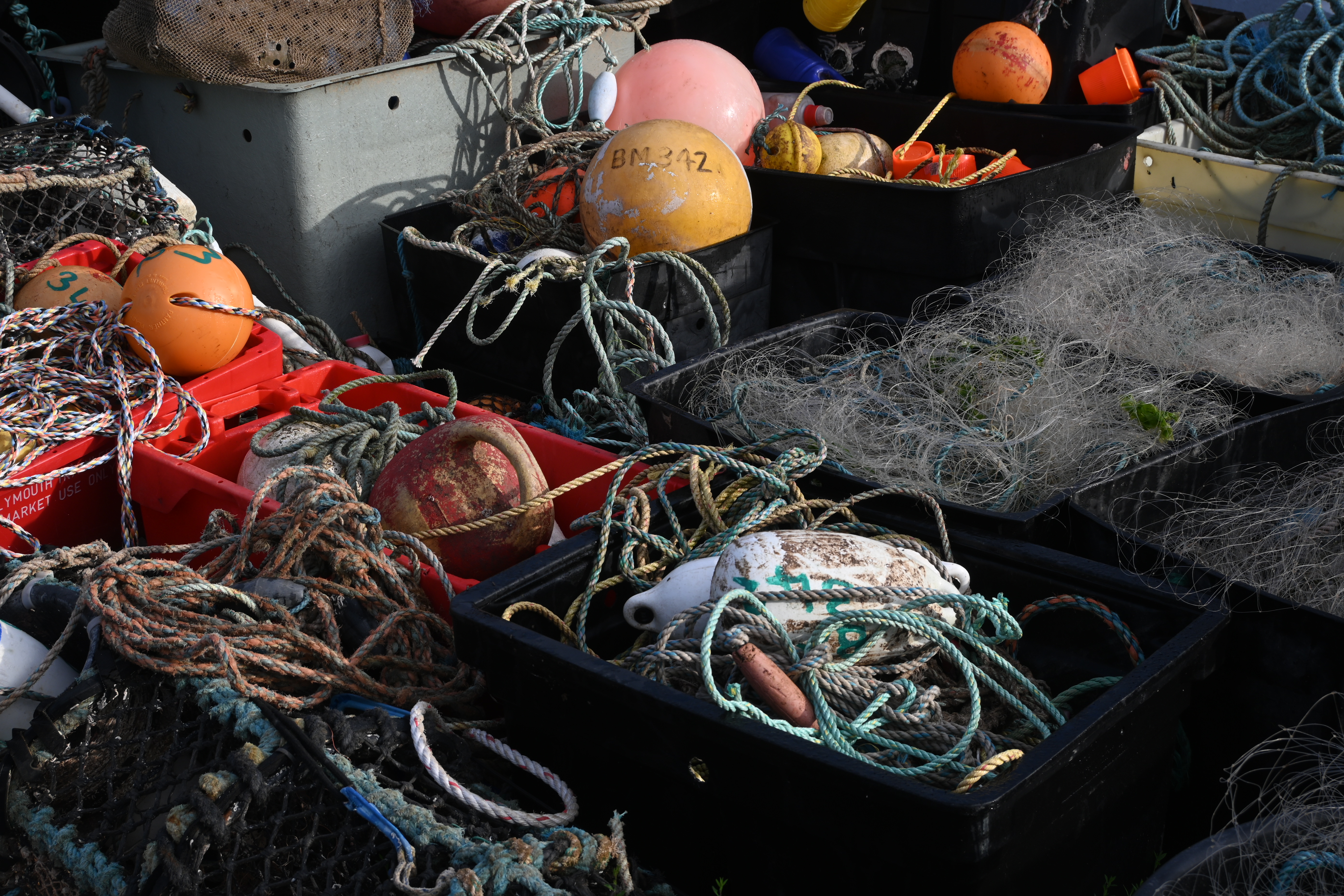 Crates of fishing ropes and buoys