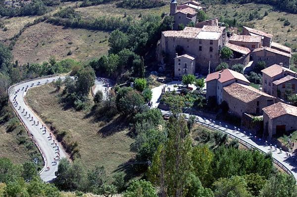 The peloton winds its way down through the Spanish mountain ranges.