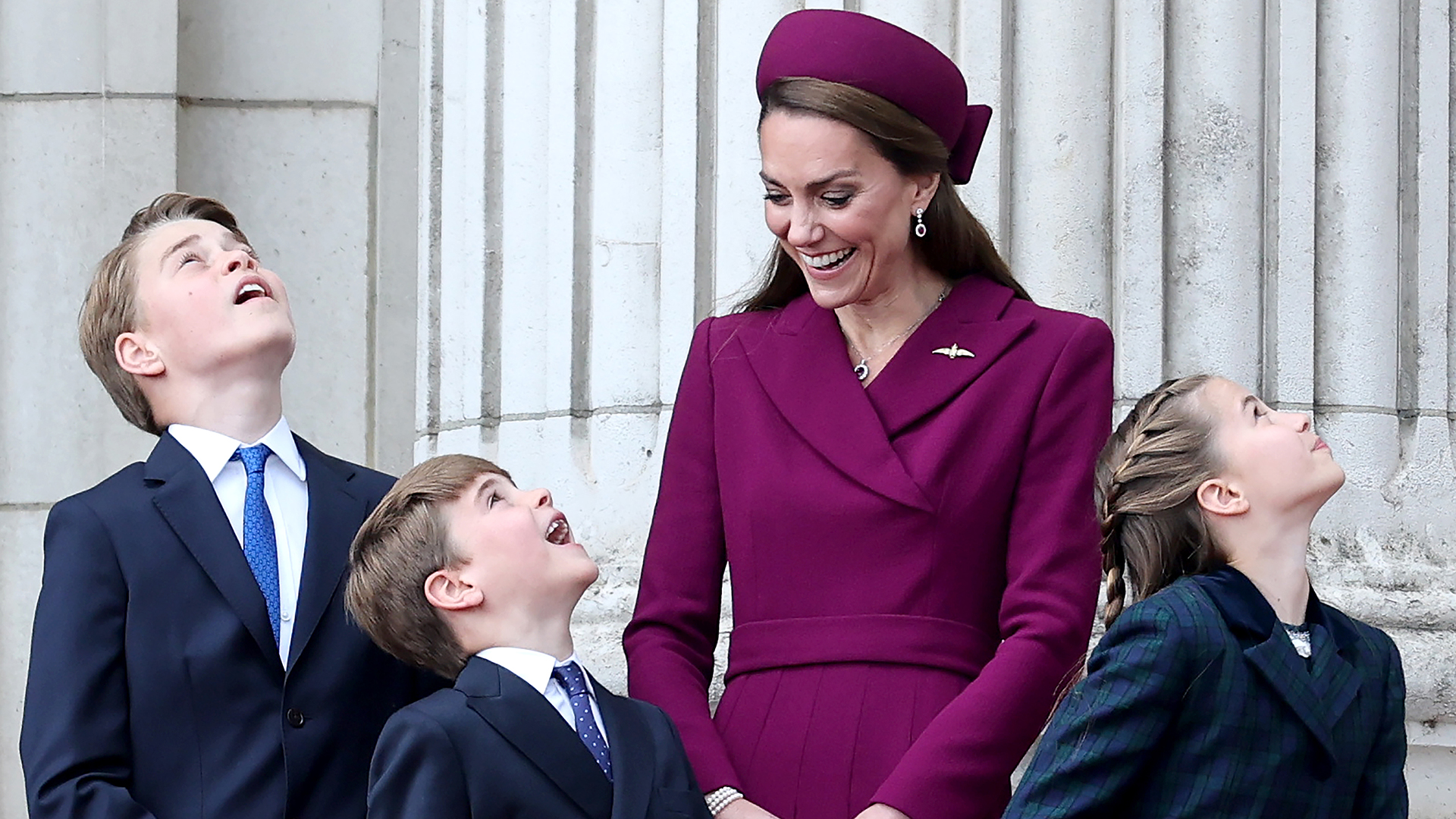 LONDON, ENGLAND - MAY 05: (L-R) Prince George of Wales, Prince Louis of Wales, Catherine, Princess of Wales and Princess Charlotte of Wales watch the fly-past on the balcony of Buckingham Palace whilst watching a fly-past during the military procession to mark the 80th anniversary of VE Day on May 05, 2025 in London, England. The King and Queen, joined by Members of the Royal Family, will take part in events from May 5th to May 8th to commemorate the 80th anniversary of VE Day, which signalled the end of the Second World War in Europe. (Photo by Chris Jackson/Getty Images)