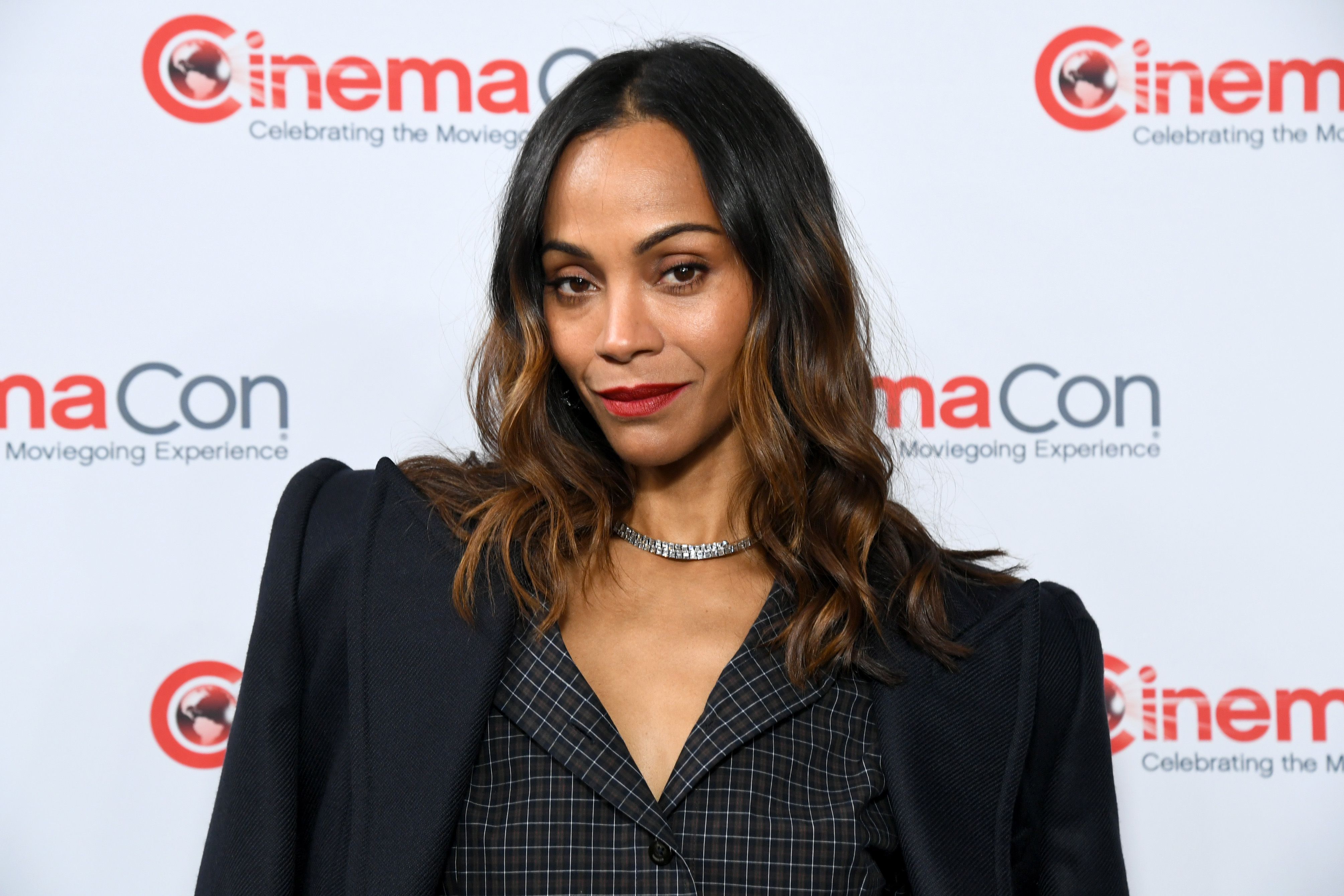 Zoe Salda&amp;ntilde;a attending an event