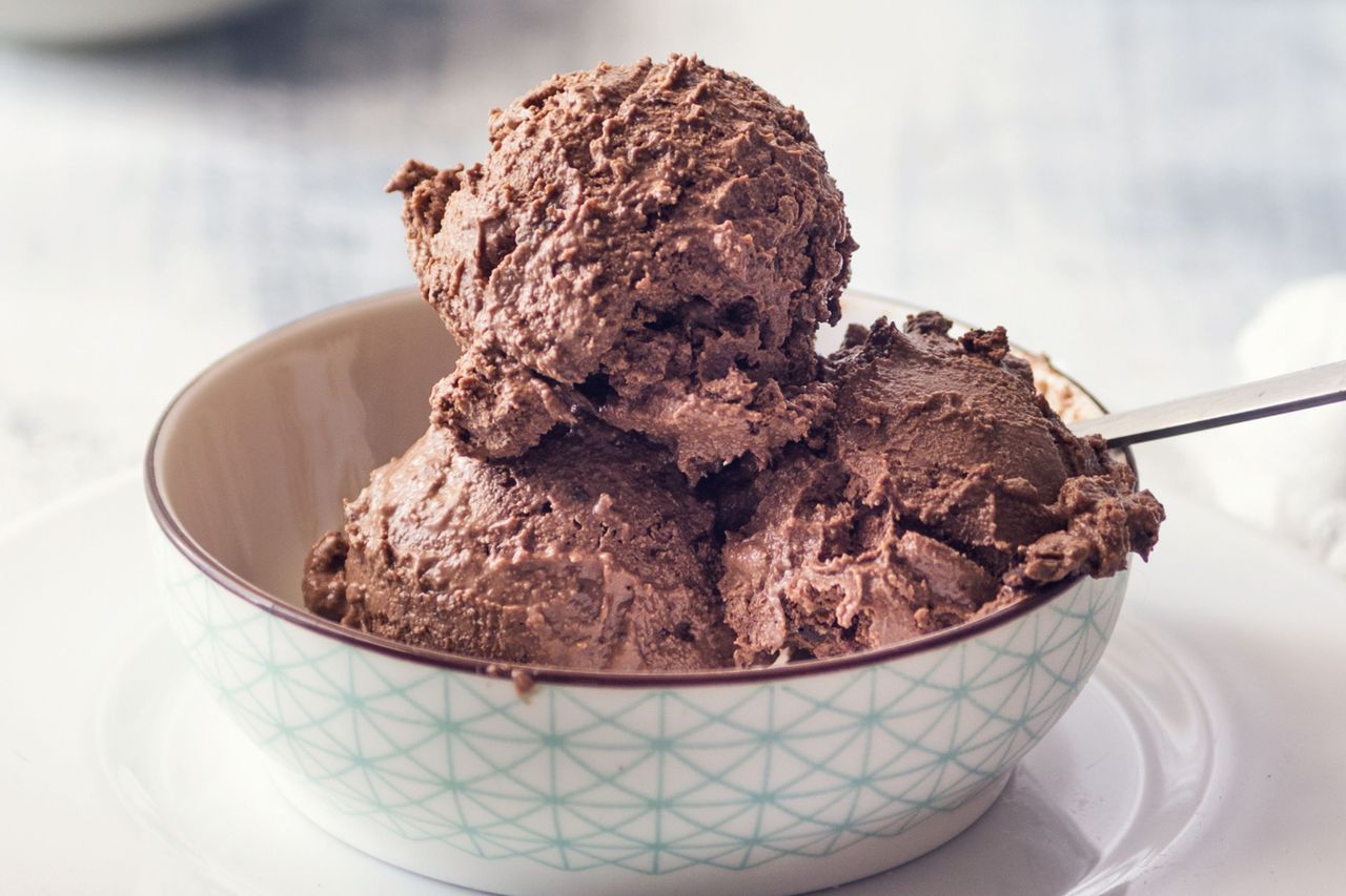 Vegan banana ice cream chocolate scoops in a bowl