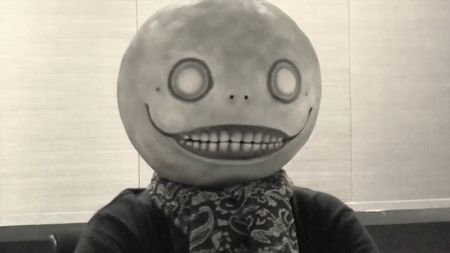 A screenshot of Yoko Taro in the "Message from NieR: Automata director Yoko Taro" Square Enix video announcing Nier: Automata's Steam release.