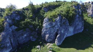An aerial view of Stajnia Cave in Poland.