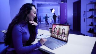 Dell Plus Laptop with someone working on editing an image