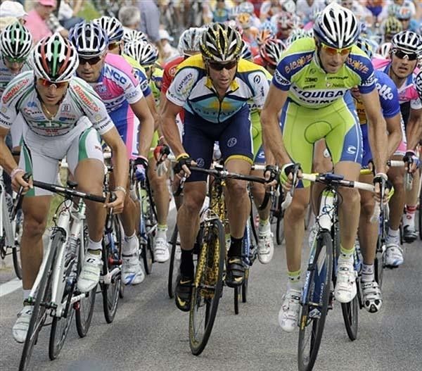 Lance Armstrong (center) rides in the bunch during stage three.